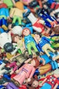 Pile of multi colored small puppets in a market stall, Antwerp, Belgium